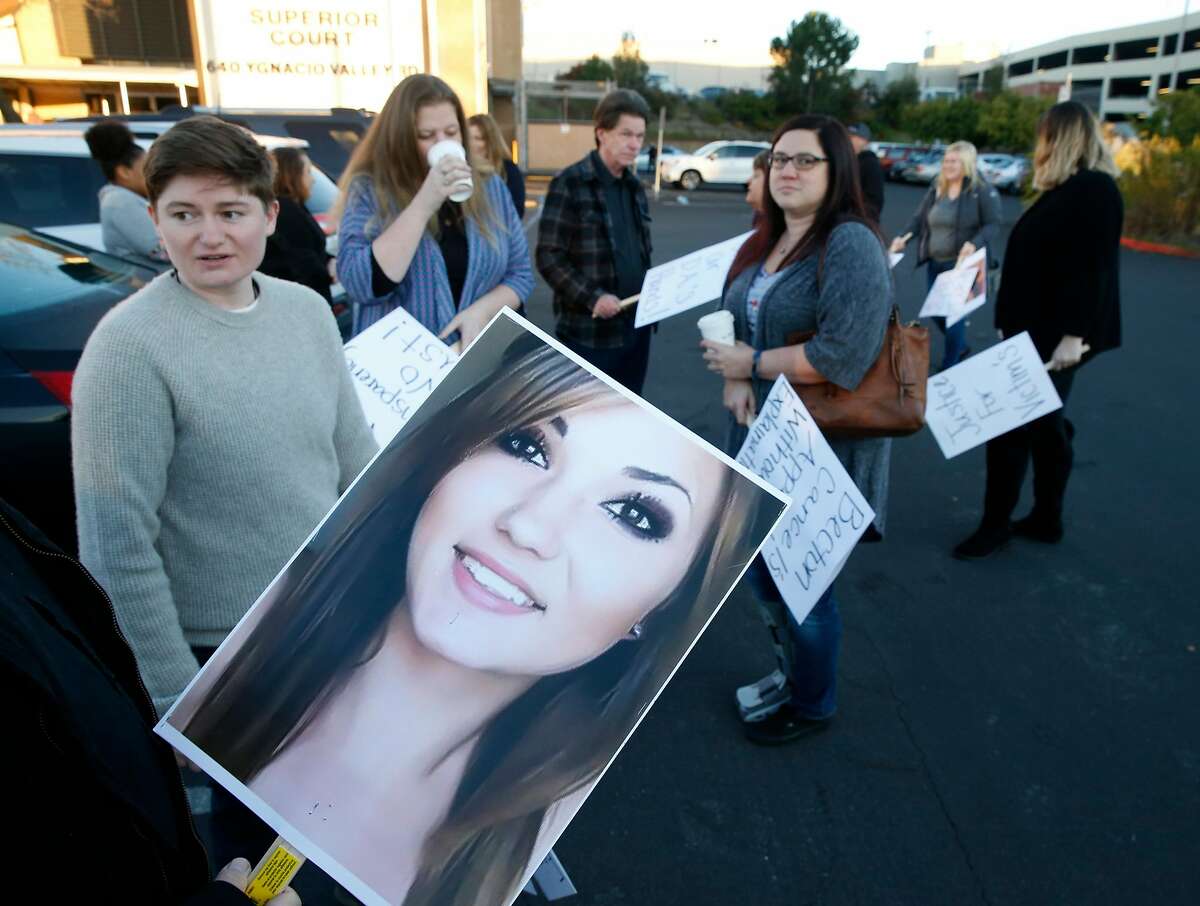 Ashley Schwartz (left), Allie Sweitzer�s sister, joins family and supporters outside Contra Costa County Superior Court in Walnut Creek, Calif. on Thursday, Jan. 24, 2019 before a hearing for Allie Sweitzer's accused killer will be held in juvenile court. Authorities say Sweitzer, 20, was murdered in 2017 by a 15-year-old gang member and was originally ordered to stand trial in adult court but a new law that went into effect Jan. 1 says no one under the age of 16 can be tried as an adult.