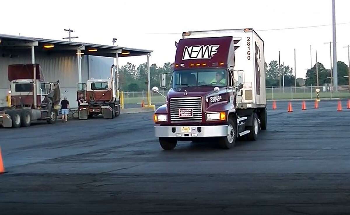 An New England Motor Freight truck during driver training at a company facility in Columbus, Ohio. (Screenshot via YouTube)