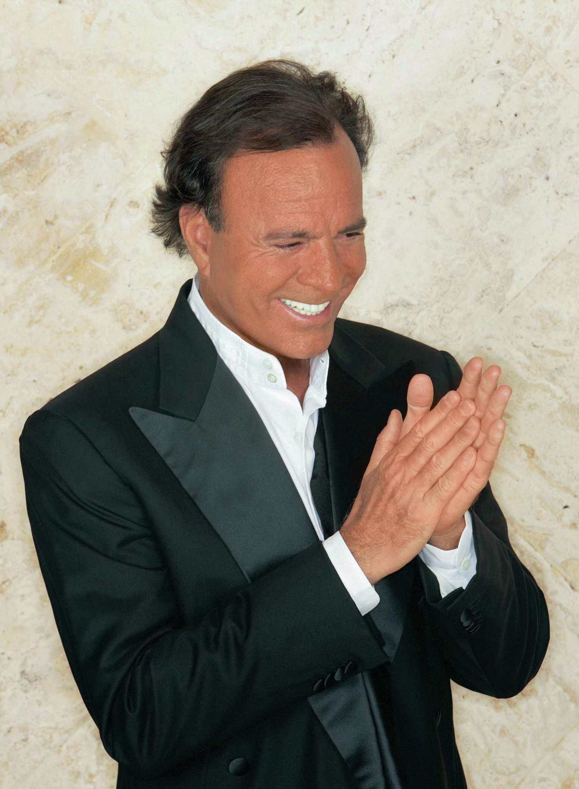 Julio Iglesias on staying inspired at 75. Hint: He swims naked