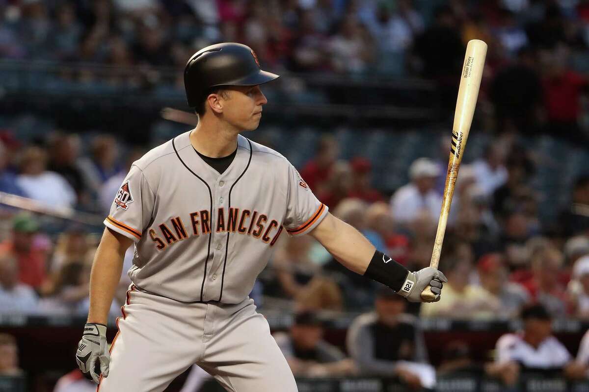 Buster Posey hits Giants first base coach during batting practice