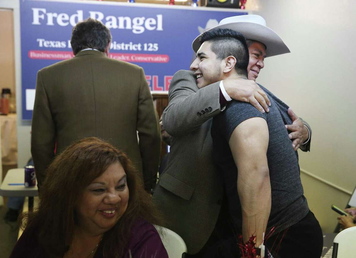 Texas House District 125 candidate Fred Rangel hugs his nephew Elijah Rangel after he learns he’s in a runoff with Ray Lopez .
