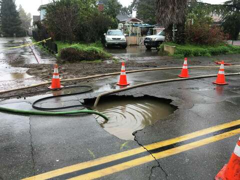 Hole Opens Up In Castro Valley Road Sinking Suv Sfgate