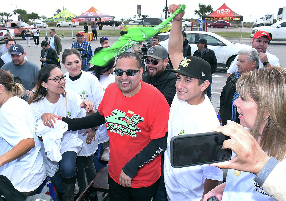 Natanaehl Barrientos, wearing red t-shirt, is congratulated by fellow contestants after winning the Stripes® Media/Celebrity Jalapeño Eating Challenge Tuesday, February 12, 2019. Barrientos set the record for the most jalapeños eaten during the Stripes® Media/Celebrity Jalapeño Eating Challenge at a very hot (and painful) 108 jalapeños in 5 minutes! Alejandro “El Brodita” Melchor from La Raza 95.7 came in second with 60 jalapeños and El Gallo JJ from La Ley 100.5 and Jocey Zamora from Z-93 tied for third place with 33 jalapeños each.