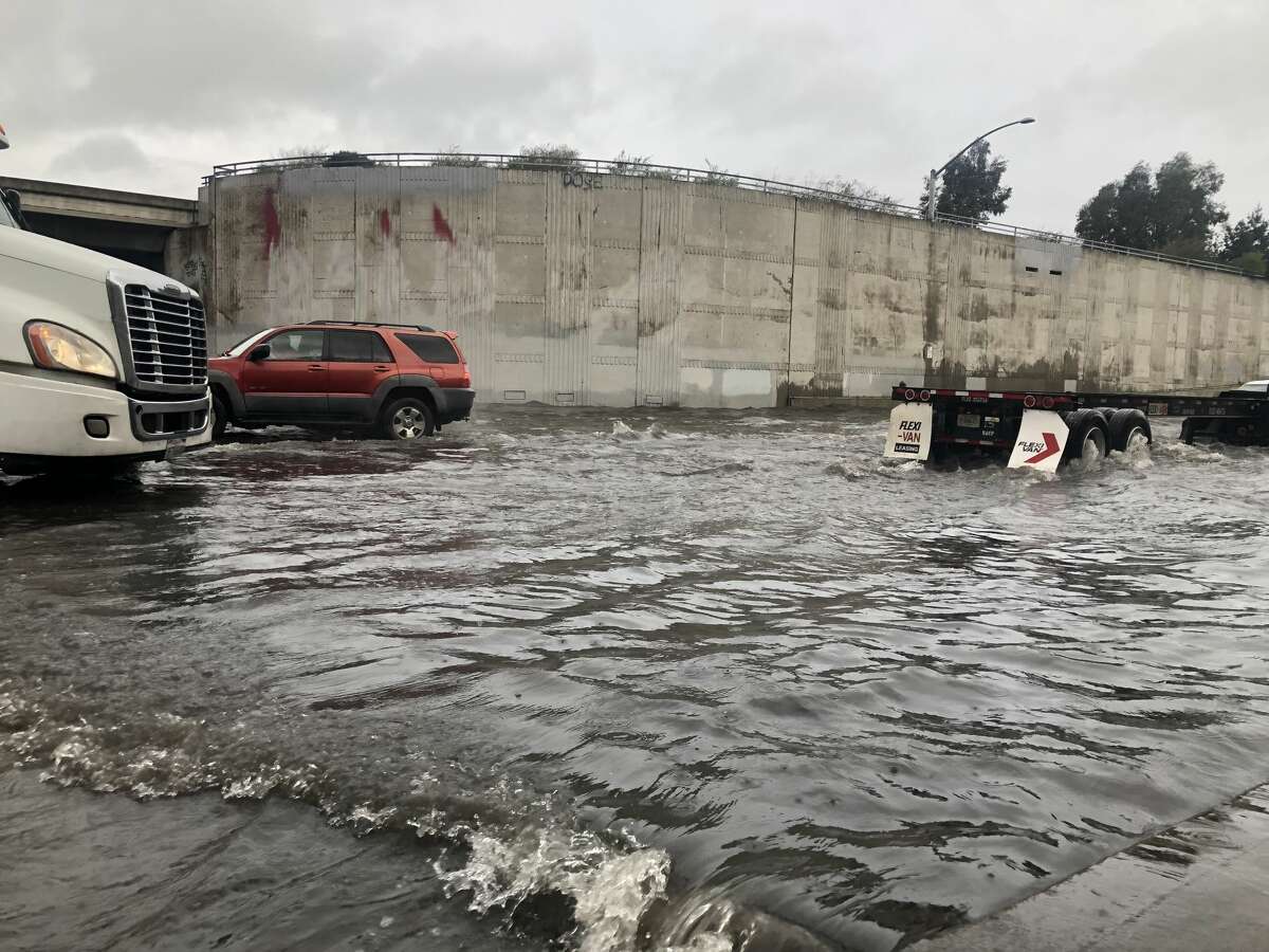 Formidable flooding was visible under the Nimitz Freeway overpass near 7th Street in West Oakland on February 14, 2019 as storms lashed the Bay Area for the second day.