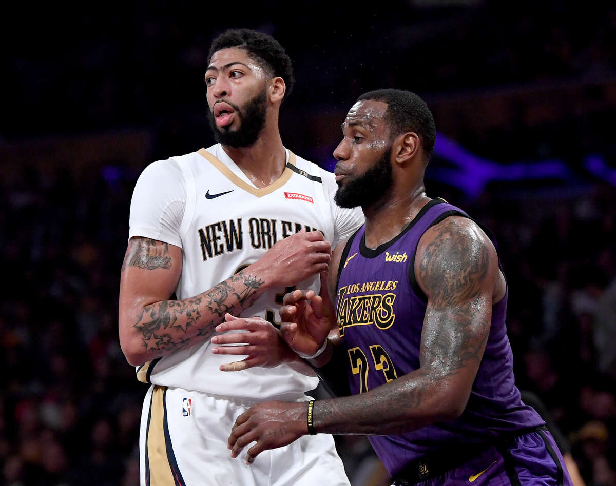 Anthony Davis (left) and LeBron James didn't come teammates at last week's NBA trade deadline, but they'll be on the same side at the All-Star Game on Sunday in Charlotte.