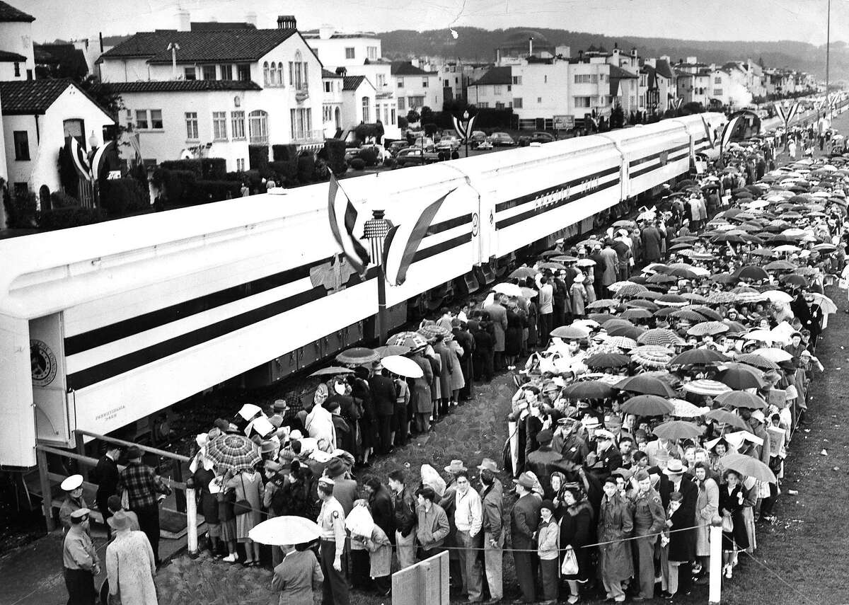 The Freedom Train would tour three hundred cities in the United States, providing people with an up close look at some of the most historic documents in history. Crowds wait in the rain to enter the train March 15, 1948 photo ran 3/16/1948, p. 8