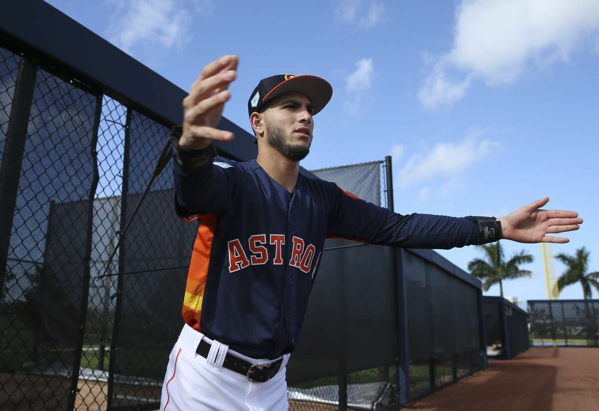 Houston Astros left handed pitcher Cionel Perez stretches during warm up at Fitteam Ballpark of The Palm Beaches on Day 1 of spring training on Thursday, Feb. 14, 2019, in West Palm Beach.