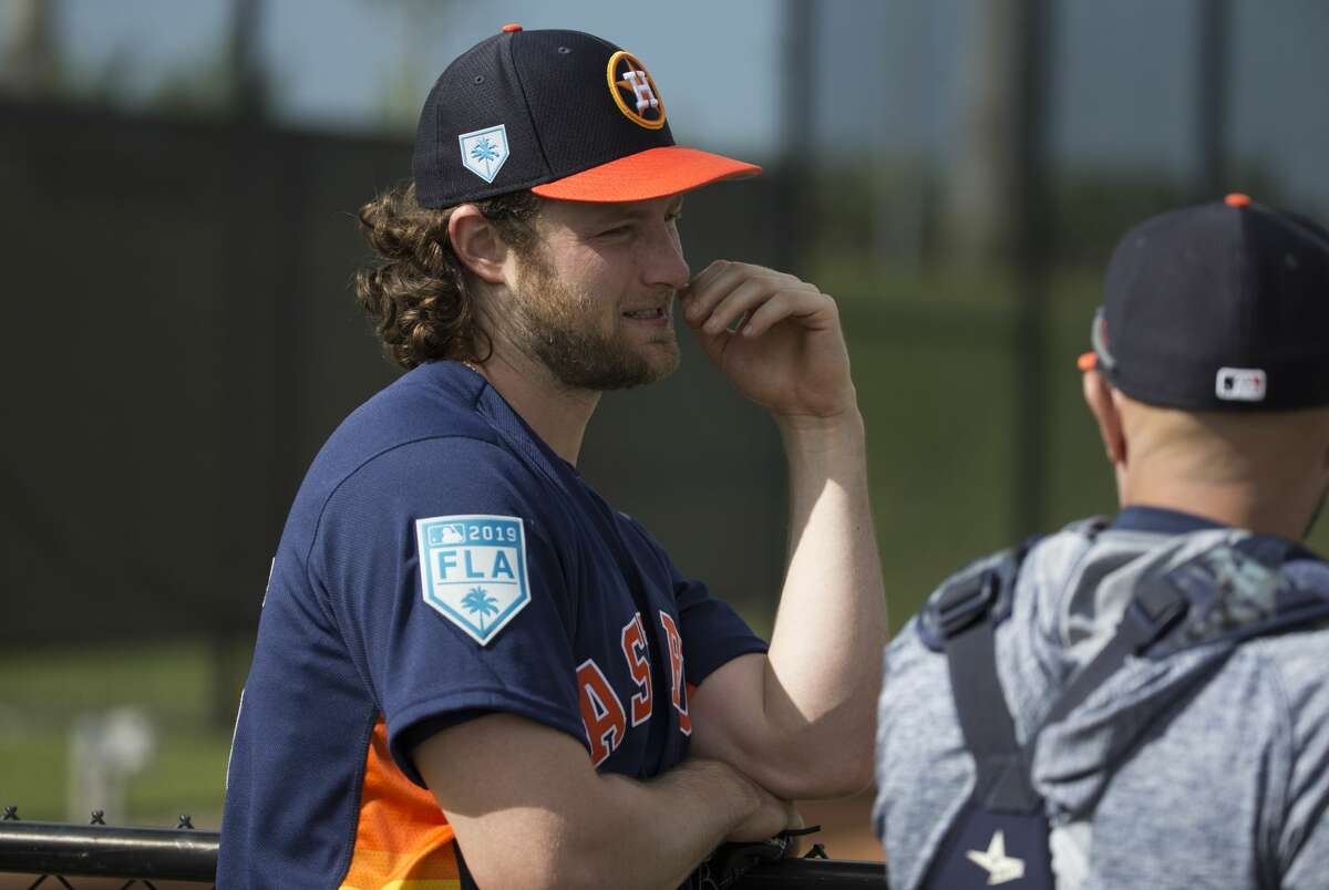 WEST PALM BEACH, FL - FEBRUARY 18: Houston Astros Manager A.J. Hinch (14)  speaks with media during a Houston Astros spring training workout at The  Ballpark of the Palm Beaches in West