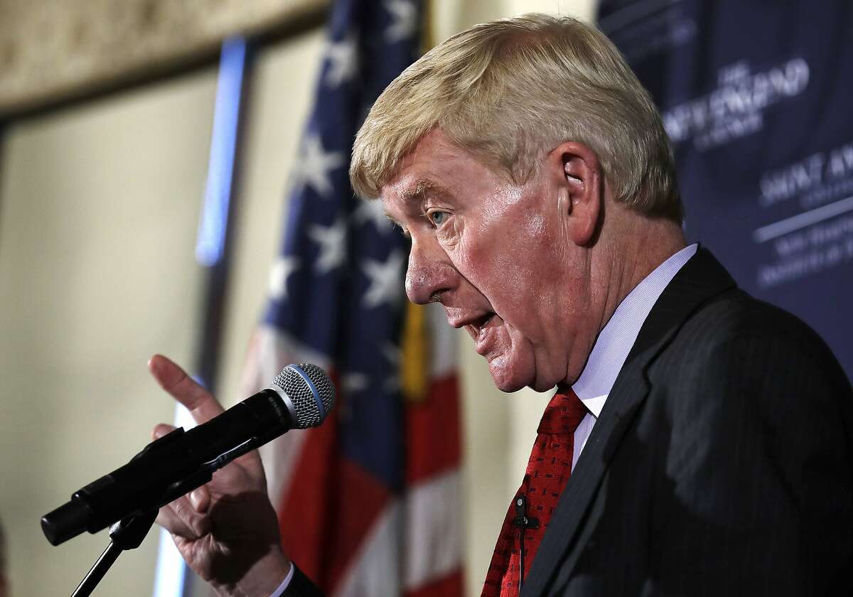 Former Massachusetts Gov. William Weld gestures during a New England Council 'Politics & Eggs' breakfast in Bedford, N.H., Friday, Feb. 15, 2019. Weld announced he's creating a presidential exploratory committee for a run in the 2020 election. (AP Photo/Charles Krupa)