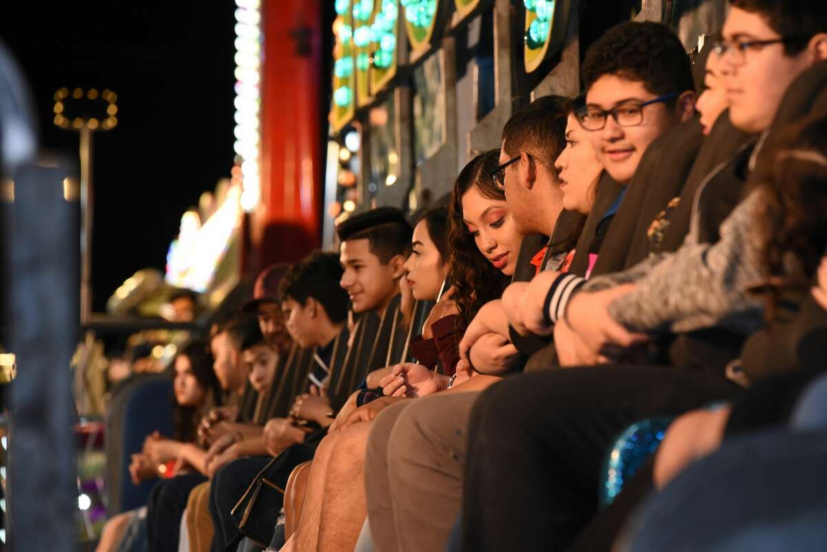 Families and couples spent Valentine's Day eating, playing and enjoying the rides at the WBCA Carnival during its opening day at the Sames Auto Arena, Thursday, February 14, 2019.