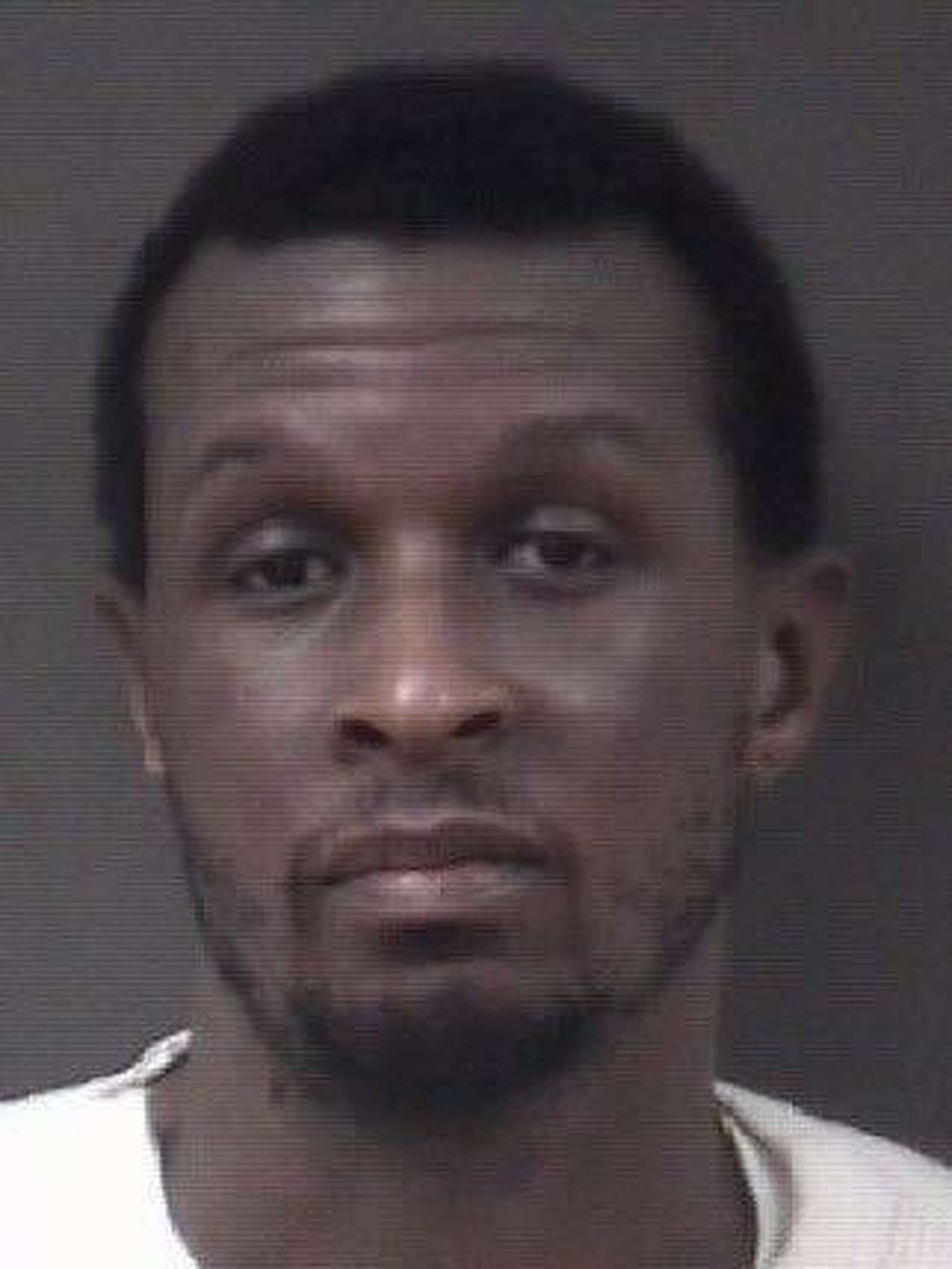Former teacher's aide pleads not guilty to sexual assault of