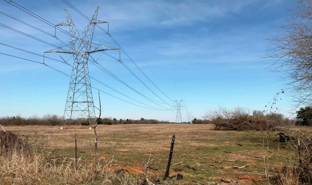 This Jan. 31, 2018 photo shows a utility corridor which runs through Freestone County, Texas, near Fairfield, in a small community of Cotton Gin. Texas Central Partners is planning to build its 240-mile high-speed rail line between Houston and Dallas along the corridor. (Dug Begley/Houston Chronicle via AP)>>> Click through to see more on the high-speed bullet train.