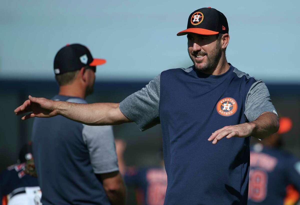 Houston Astros right handed pitcher Justin Verlander (35) stretches at Fitteam Ballpark of The Palm Beaches on Day 2 of spring training on Friday, Feb. 15, 2019, in West Palm Beach.