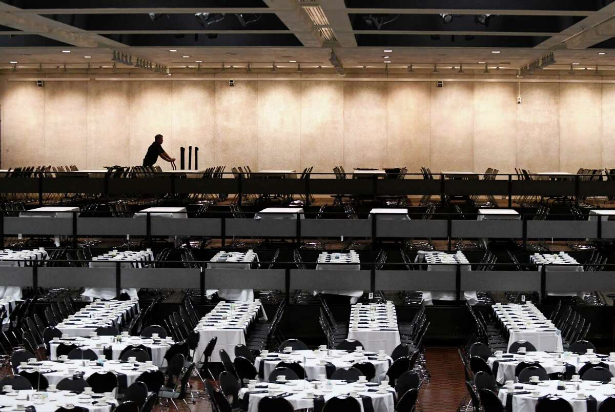 Tables are set for the Black and Puerto Rican Caucus at the Empire State Convention Center on Friday, Feb. 15, 2019, in Albany, N.Y. The 48th annual legislative conference for the NYS Association of Black and Puerto Rican Legislators began Friday. (Will Waldron/Times Union)