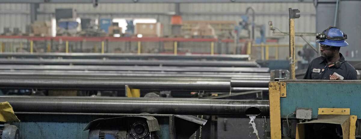 Steel pipes are made at the Borusan Mannesmann Pipe manufacturing facility in Baytown, Texas. Borusan is one of many Houston-area companies that have sought waivers for steel tariffs from the U.S. Commerce Department. (AP Photo/David J. Phillip)