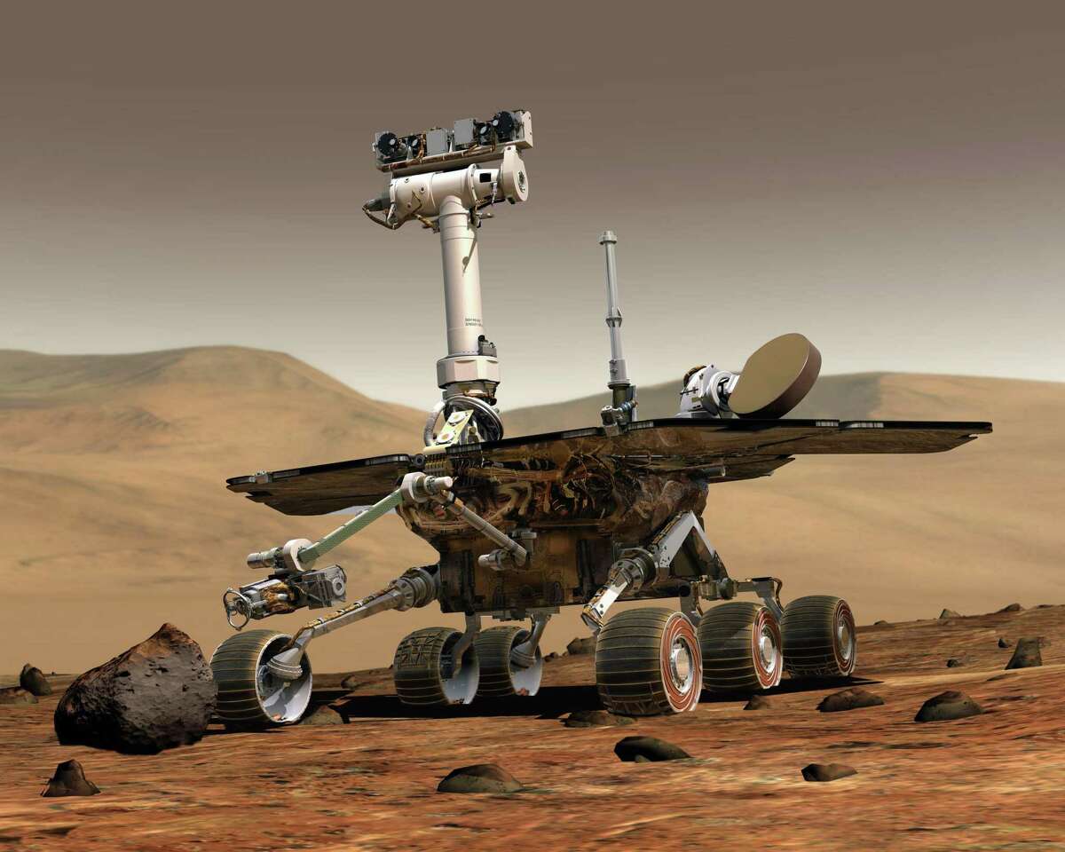 FILE -- An image provided by NASA shows an artist's rendering of the Opportunity rover on the surface of Mars. The rover, which landed in January 2004, was designed for 90 days of exploration but remained functional for more than 5,000 Martian days. (NASA via The New York Times) -- EDITORIAL USE ONLY --
