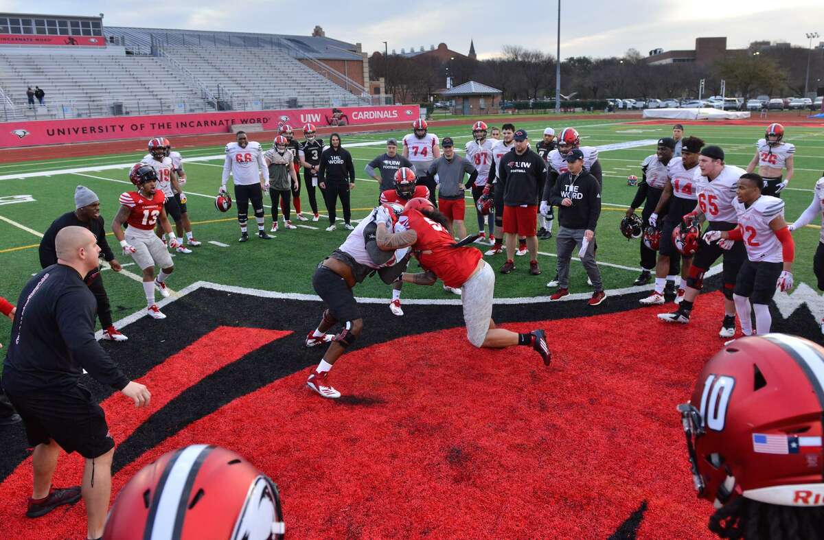 Players go through drills during spring football practice for the University of the Incarnate Word at Benson Stadium.