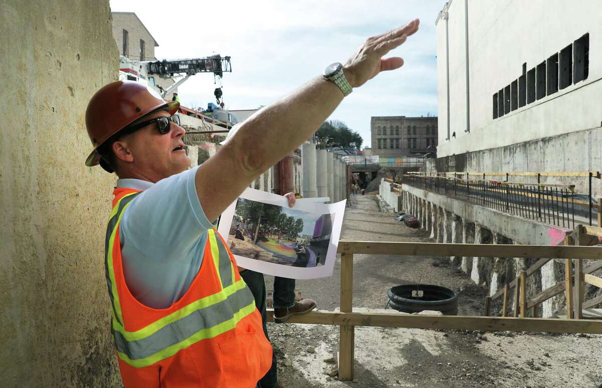Kerry Averyt of the San Antonio River Authority and Project Manager gives a tour to see current construction of the second segment of the San Pedro Creek Culture Park, on Friday, Feb. 15, 2019.