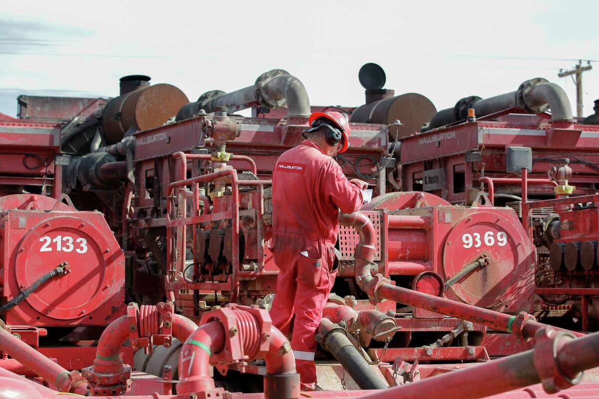 Oil-field services firm Halliburton joined its rivals in cutting losses in the third quarter,