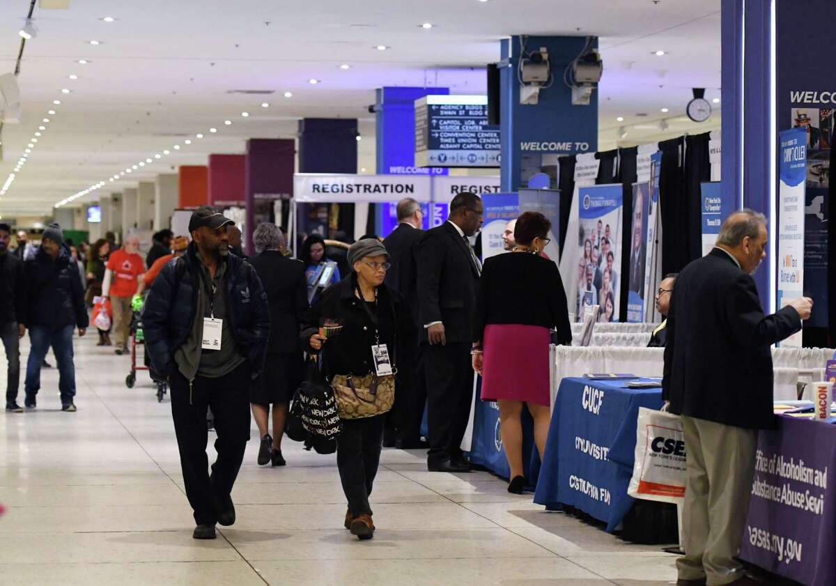 People browse various booths during the New York State Association of Black and Puerto Rican Legislators conference Saturday, Feb. 16, 2019 in the main concourse area in Albany, NY. (Phoebe Sheehan/Times Union)