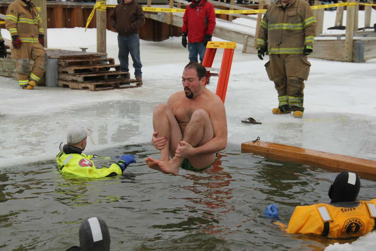 Scenes from the Polar Bear Dip, which was held at the Caseville Shanty Days on Saturday.