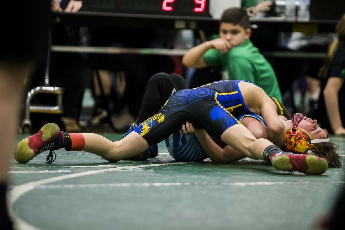 Young wrestlers face off during the NEMWA Youth Wrestling League Regional Tournament on Saturday, Feb. 16, 2019 at Freeland High School. (Katy Kildee/kkildee@mdn.net)