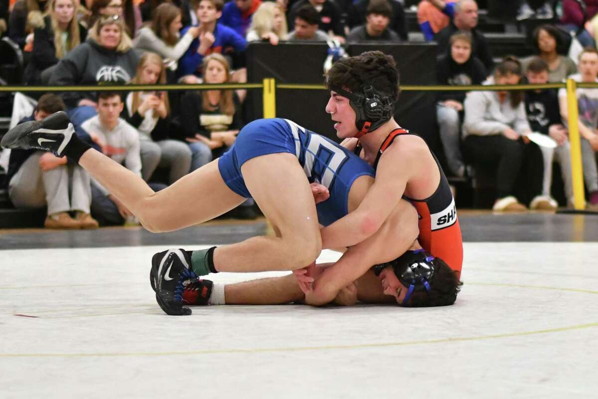 Cole Shaughnessy of the Fairfield Warde Mustangs and Jacob Cardozo of Southington wrestle in the 145lb weight class during the CIAC Class LL finals on Saturday February 16, 2019 at Trumbull High School in Trumbull, Connecticut.