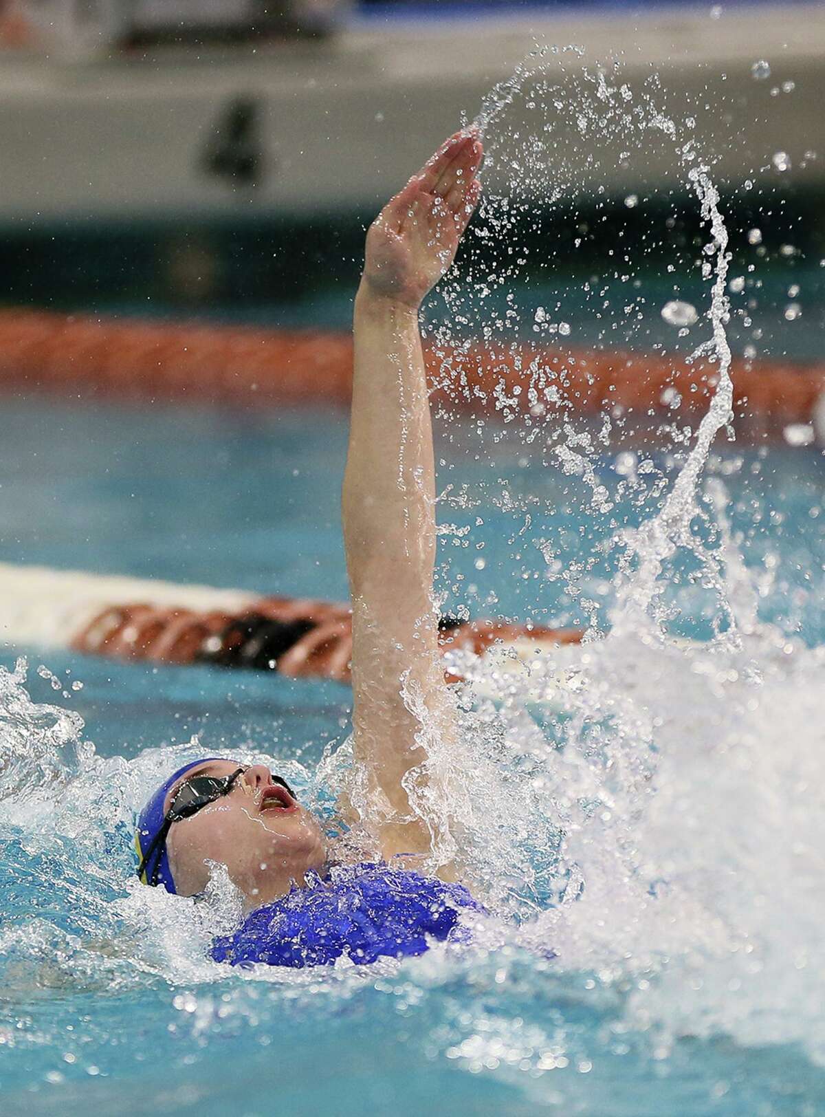 Alamo Heights' Lila Foote swims in the girls 100-yard backstroke during the UIL Class 5A state championship at the Jamail Swimming Center at the University of Texas at Austin on Saturday, Feb. 16, 2019. Foote finished fifth in the event with a time of 57.87 seconds.