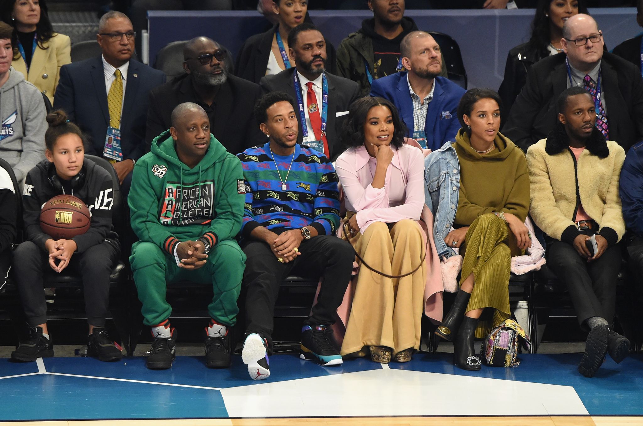 Celebrities sitting courtside at the NBA All-Star Game