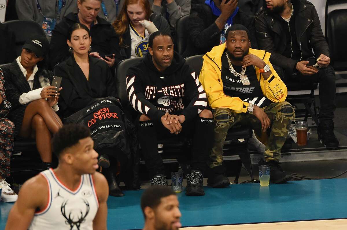 Celebrities sitting courtside at NBA All-Star Game