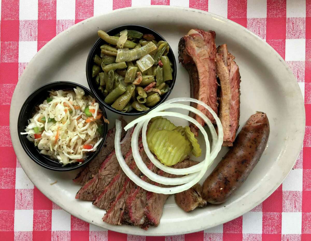 The Classic Trio Plate with brisket, ribs and sausage from Goodfire BBQ