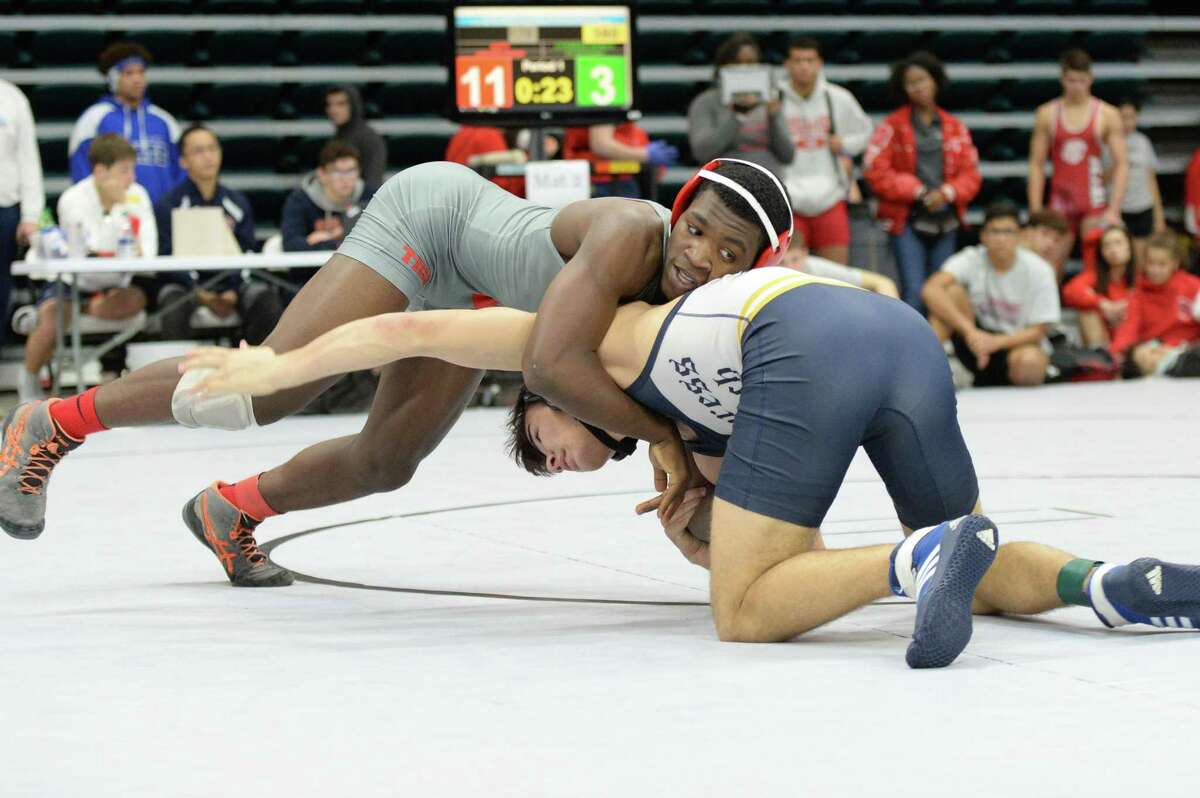Kishawn Higgins of Katy HS and Dylan Nowak of Cy-Ranch compete in the boys 170 pound weight class during the Region III 6-A UIL Wrestling Championships on Saturday February 16, 2019 at the Merrell Center, Katy, TX.