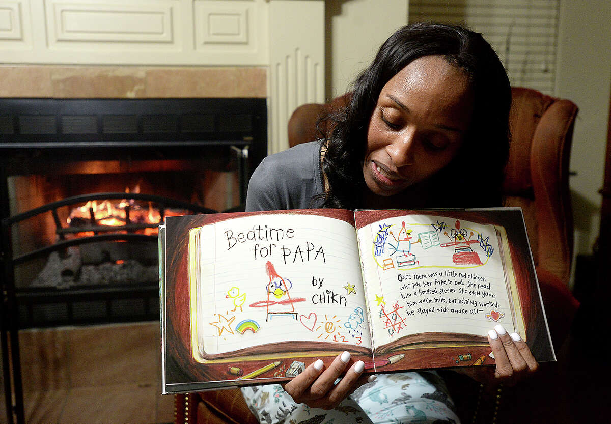 Homer Elementary School Principal Dr. Belinda George reads from the award winning children's book "Interrupting Chicken" via Facebook Live from her home Tuesday night. Dr. George does the online bedtime story readings every Tuesday since first starting the project at Christmas. Her weekly "Tucked In Tuesdays" is now shared by other Beaumont ISD elementary schools, and is helping those students meet their AR Book reading requirements, as well as her Homer Elementary School scholars. After finishing the story, Dr. George engages her audience with questions and interacts with them throughout the reading. Keeping the readings enthusiastic and recording them in different parts of her home, with the occasional visit from her rescued box turtle Franny Fae, makes the storytime fun for her and for the growing number of children and parents tuning in each week. Photo taken Tuesday, January 29, 2019 Photo by Kim Brent/The Enterprise