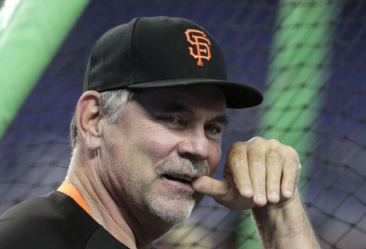 FILE - In this June 12, 2018, file photo, San Francisco Giants manager Bruce Bochy watches batting practice before a baseball game against the Miami Marlins, in Miami. Bochy says he will retire after this season, his 25th as a big league manager. Bochy says he told the team of his decision on Monday, Feb. 18, 2019. (AP Photo/Lynne Sladky, File)