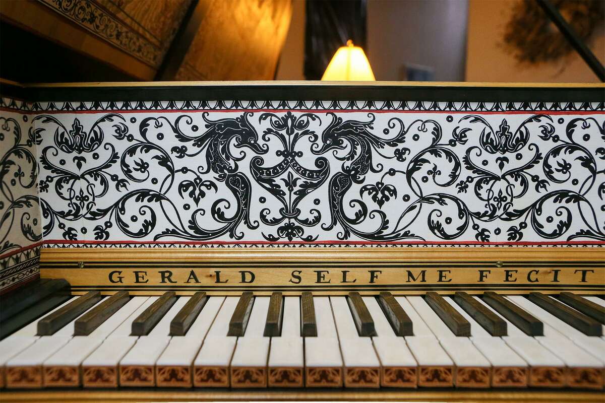 A 17th century Flemish-style harpsichord built by Gerald Self includes an elaborate nameboard.
