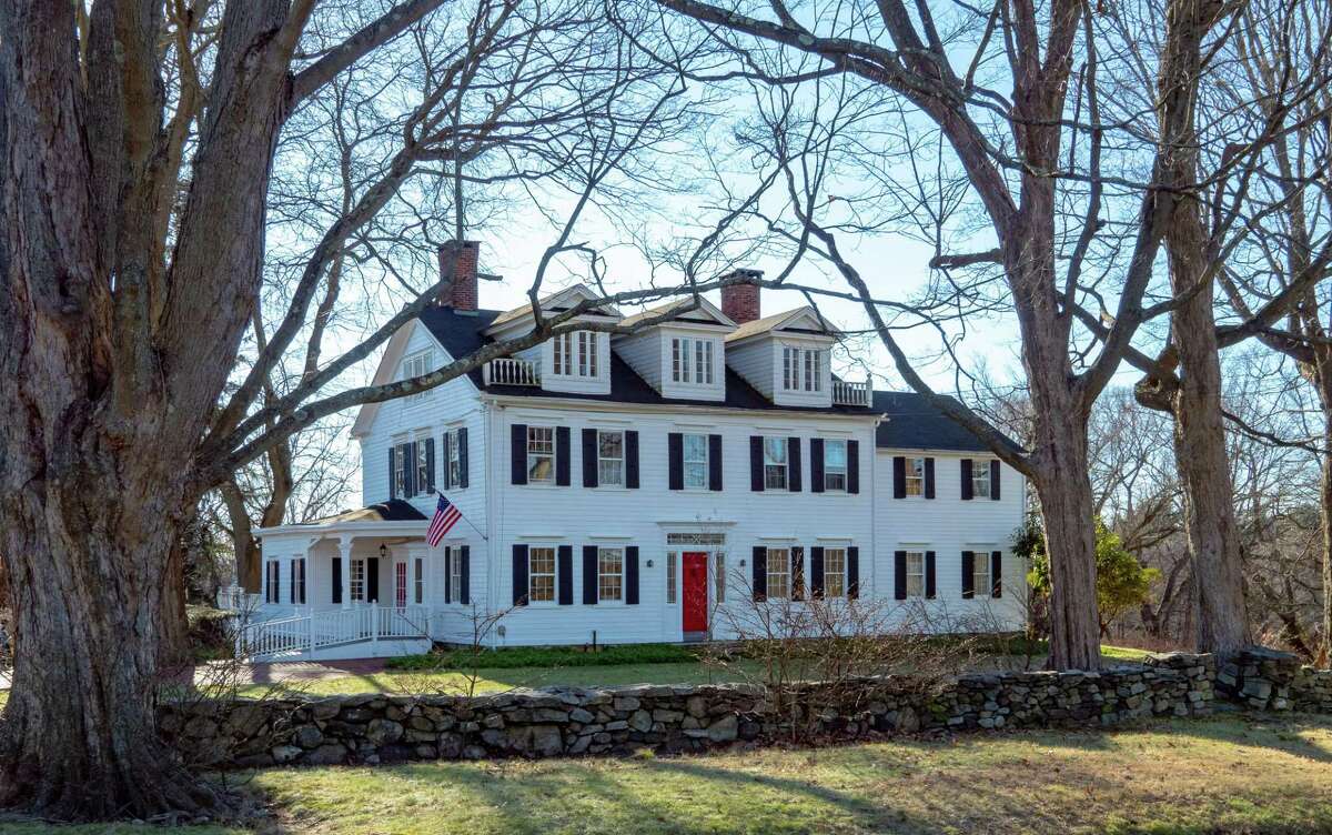 The landmark antique colonial house 65 Norfield Road sits on a level property of just over four acres in the heart of Weston, and was once owned by John Orr Young, a co-founder of Young & Rubicam.