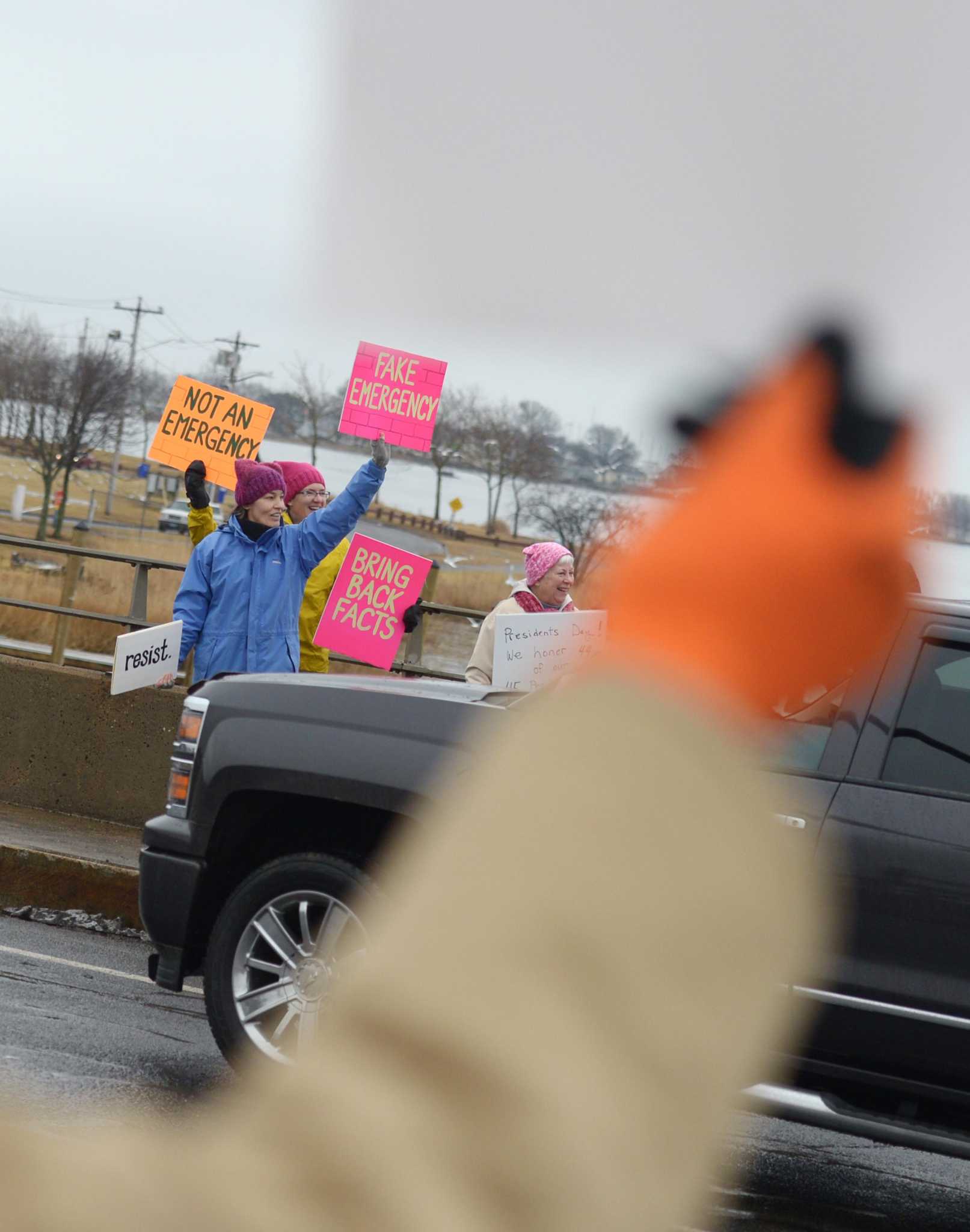 Dozens protest in Norwalk against Trump’s border wall national emergency