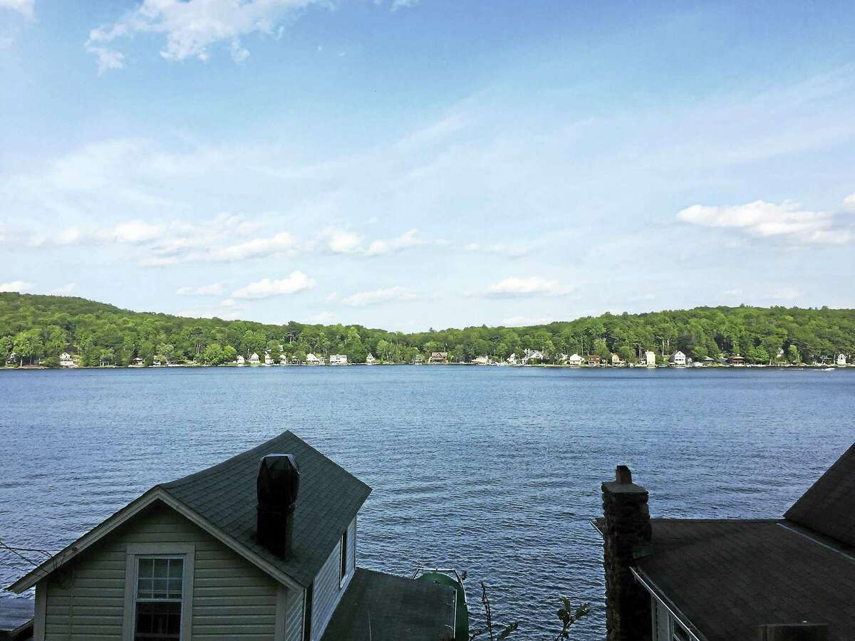 Property owners on Highland Lake are asked to help prevent erosion and refrain from using pesticides and herbicide to help improve the clarity of the water.