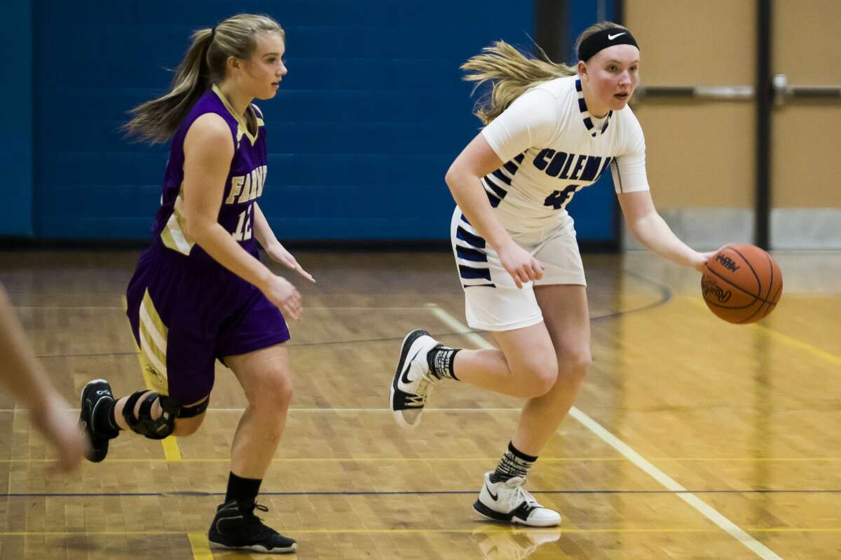 Coleman's Katelyn Pnacek dribbles down the court during a game against Farwell on Monday, Feb. 18, 2019 at Coleman High School. (Katy Kildee/kkildee@mdn.net)
