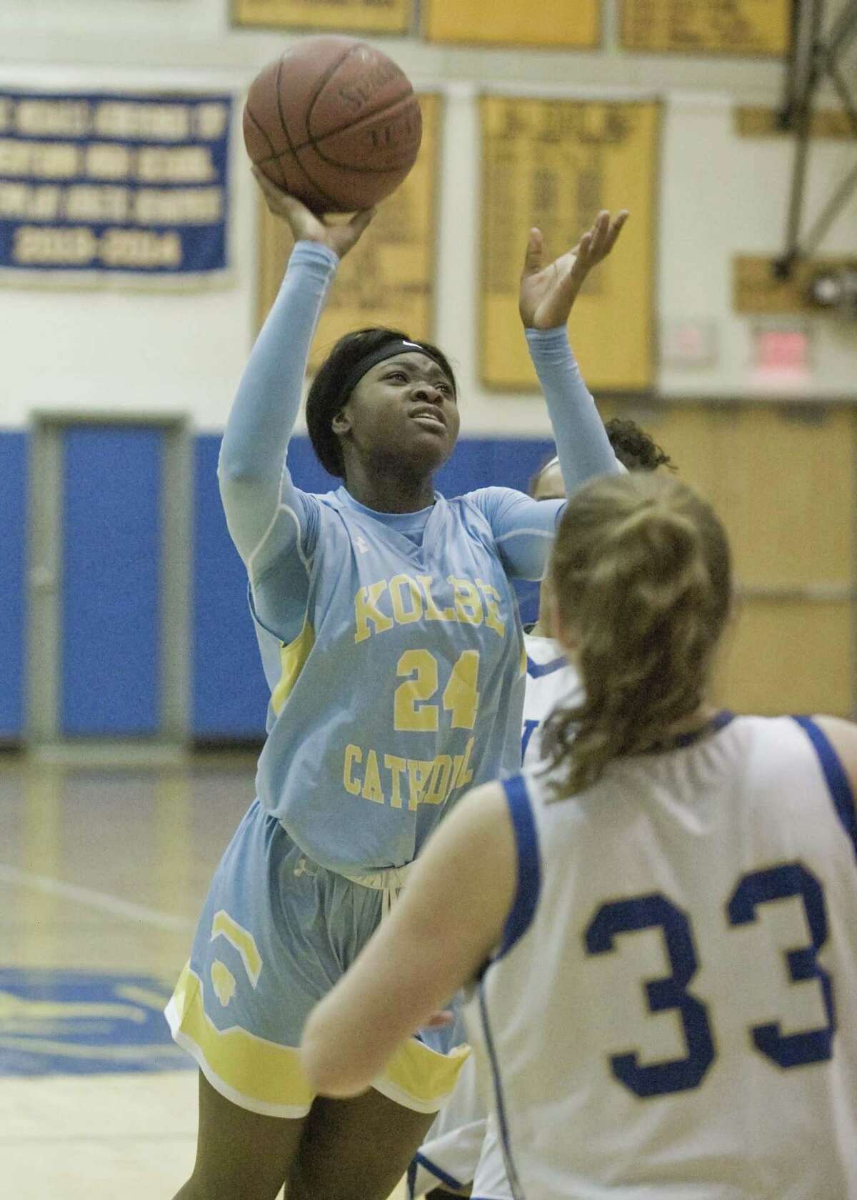 Kolbe Cathedral High School's Brianna Meekins gets off a shot in the SWC girls basketball tournament quarterfinal game against Newtown High School, played at Newtown. Monday, Feb. 18, 2019