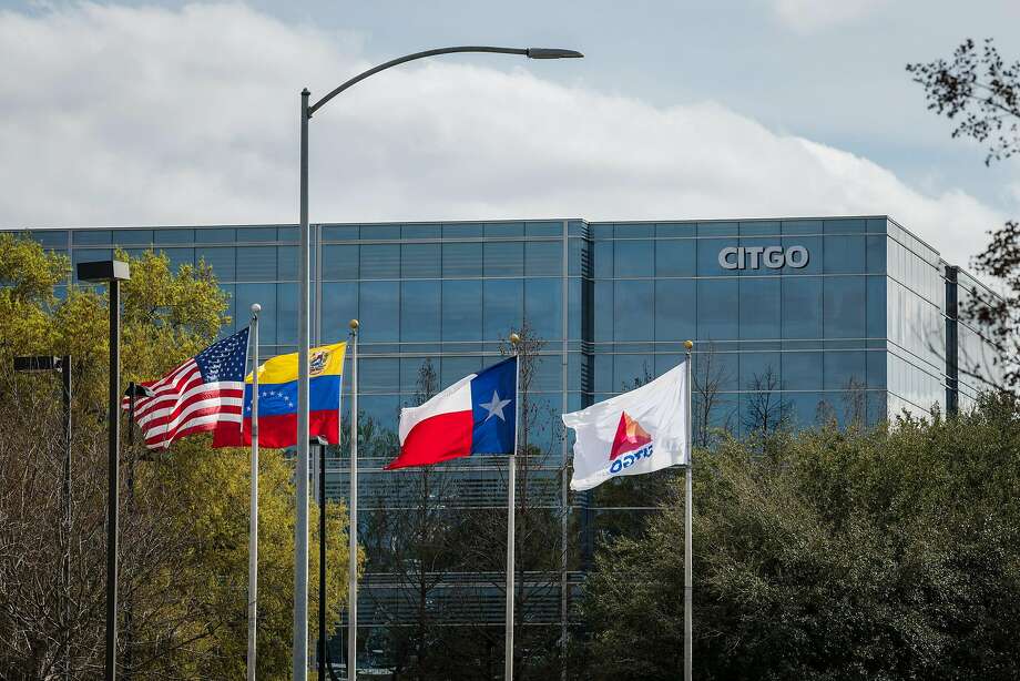 Flags fly outside Citgo Petroleum Corp. headquarters stands in Houston, Texas, U.S., on Thursday, Feb. 14, 2019.

NEXT: See the world's largest oil refineries. Photo: Loren Elliot, Bloomberg