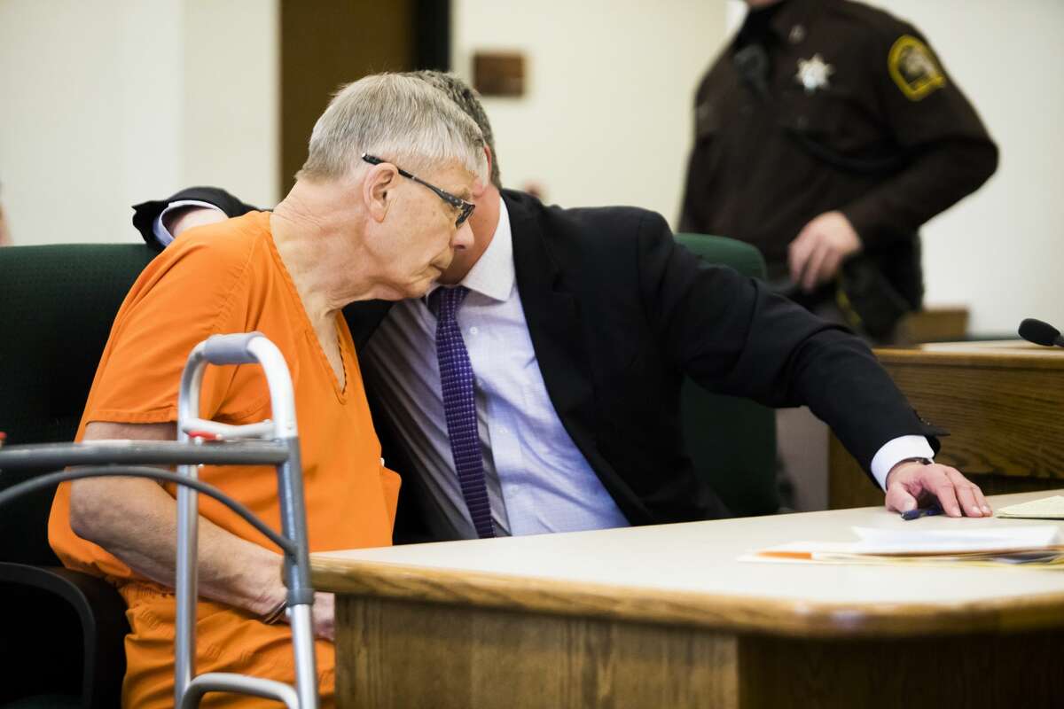 Gary Arthur Gatza, 74, left, speaks with his attorney, Stephen Durance, right, during a probable cause hearing on four felony charges including operating while intoxicated in relation to a Jan. 1 collision causing the death of 44-year-old Stanley Dulaney Jr. on Tuesday, Feb. 19, 2019 at the Midland County Courthouse. (Katy Kildee/kkildee@mdn.net)