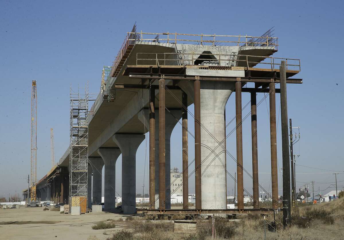FILE - This Dec. 6, 2017, file photo shows one of the elevated sections of the high-speed rail under construction in Fresno, Calif. During his first State of the State speech last week, Gov. Gavin Newsom said that he is committed to finishing the Central Valley portion of the bullet train. (AP Photo/Rich Pedroncelli, file)