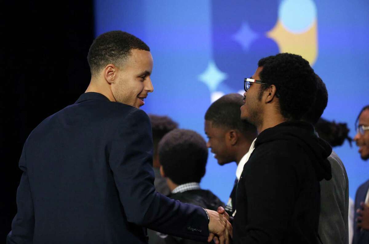 Golden State Warriors guard Stephen Curry greets folks following his town hall conversation with former President Barack Obama at the My Brother's Keeper (MBK) Rising! event at the Oakland Scottish Rite Center in Oakland, Calif. on Tuesday, February 19, 2019. My BrotherÕs Keeper (MBK) Rising! is a national gathering of the MBK Alliance, now an initiative of the Obama Foundation.