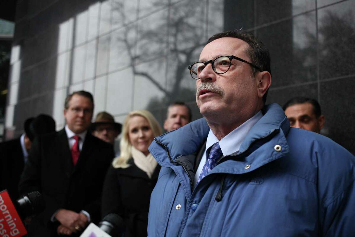 Lawyer Robert Fickman speaks in support of U.S. District Court Judge Lynn N. Hughes outside the Bob Casey United States Courthouse on Feb. 19, 2019.