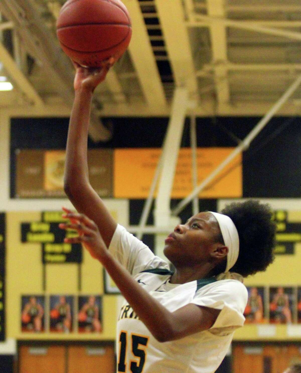 Trinity Catholic’s Iyanna Lops had 29 points, 16 rebounds and 8 blocks in Tuesday’s FCIAC semifinal win over Ridgefield.
