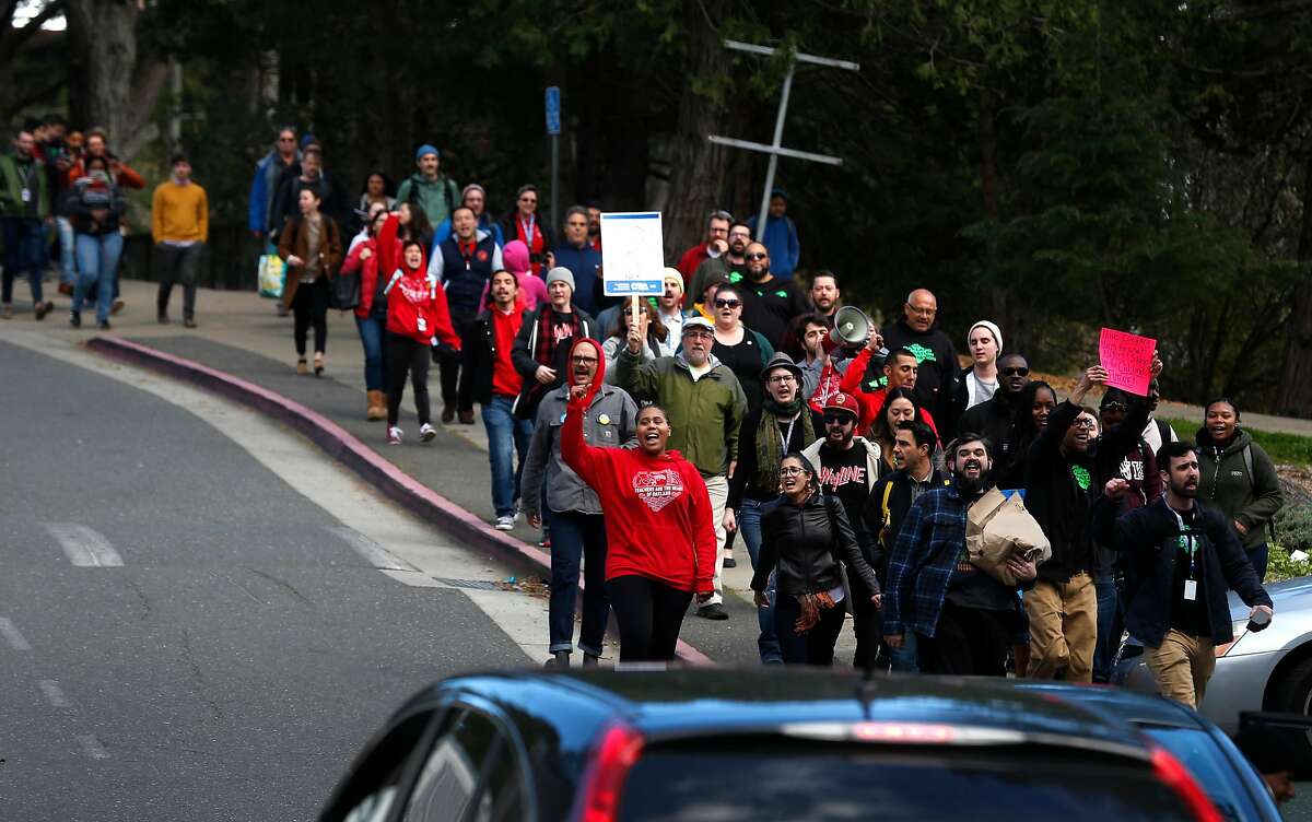 Skyline High School teachers march off campus in solidarity on the eve of a teachers strike against the Oakland Unified School District in Oakland, Calif. on Wednesday, Feb. 20, 2019.