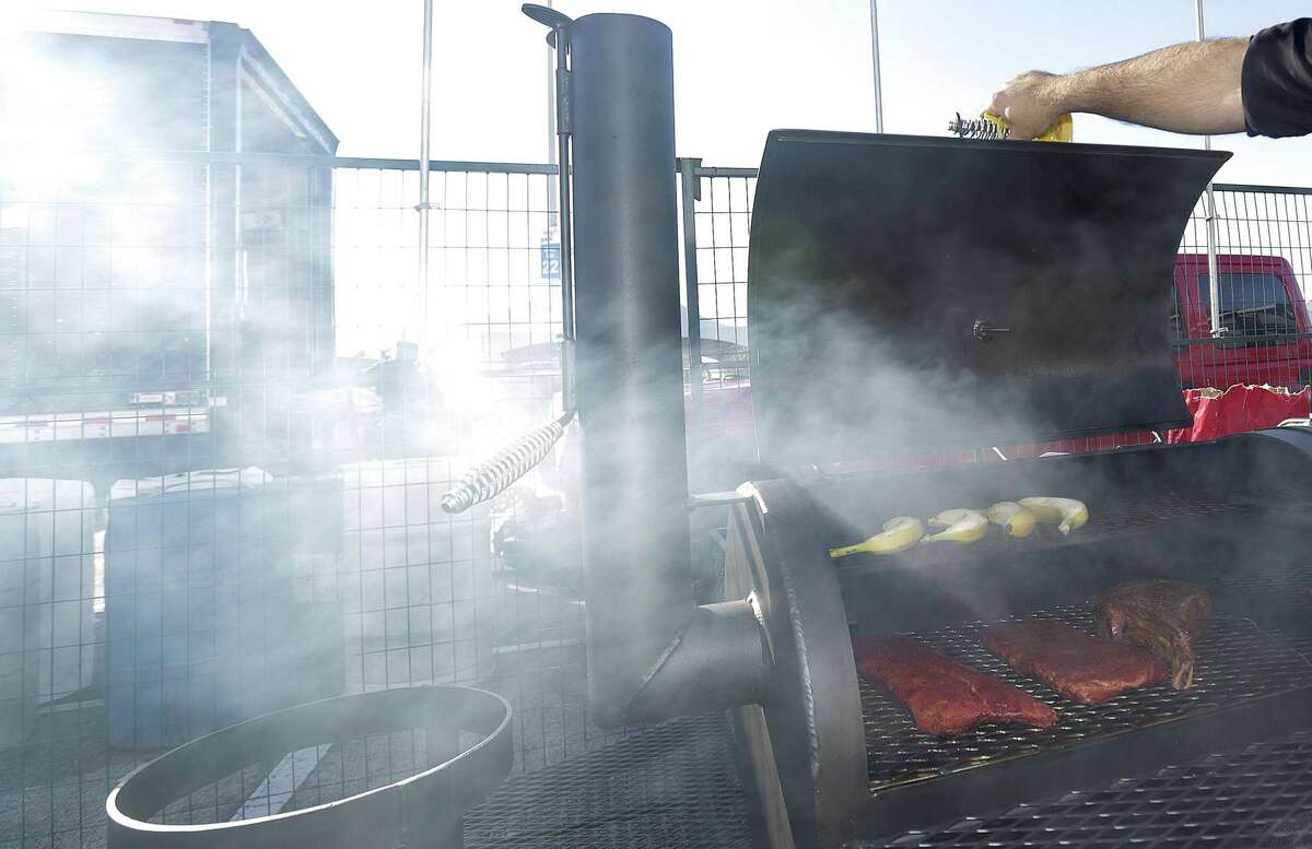 Members of the Brazilian Bar-B-Que team test their grill as they set up for the Houston Rodeo's World's Championship Bar-B-Que Contest, one of competition barbecue's most prestigious cook-offs, at NRG on Wednesday, Feb. 20, 2019 in Houston.