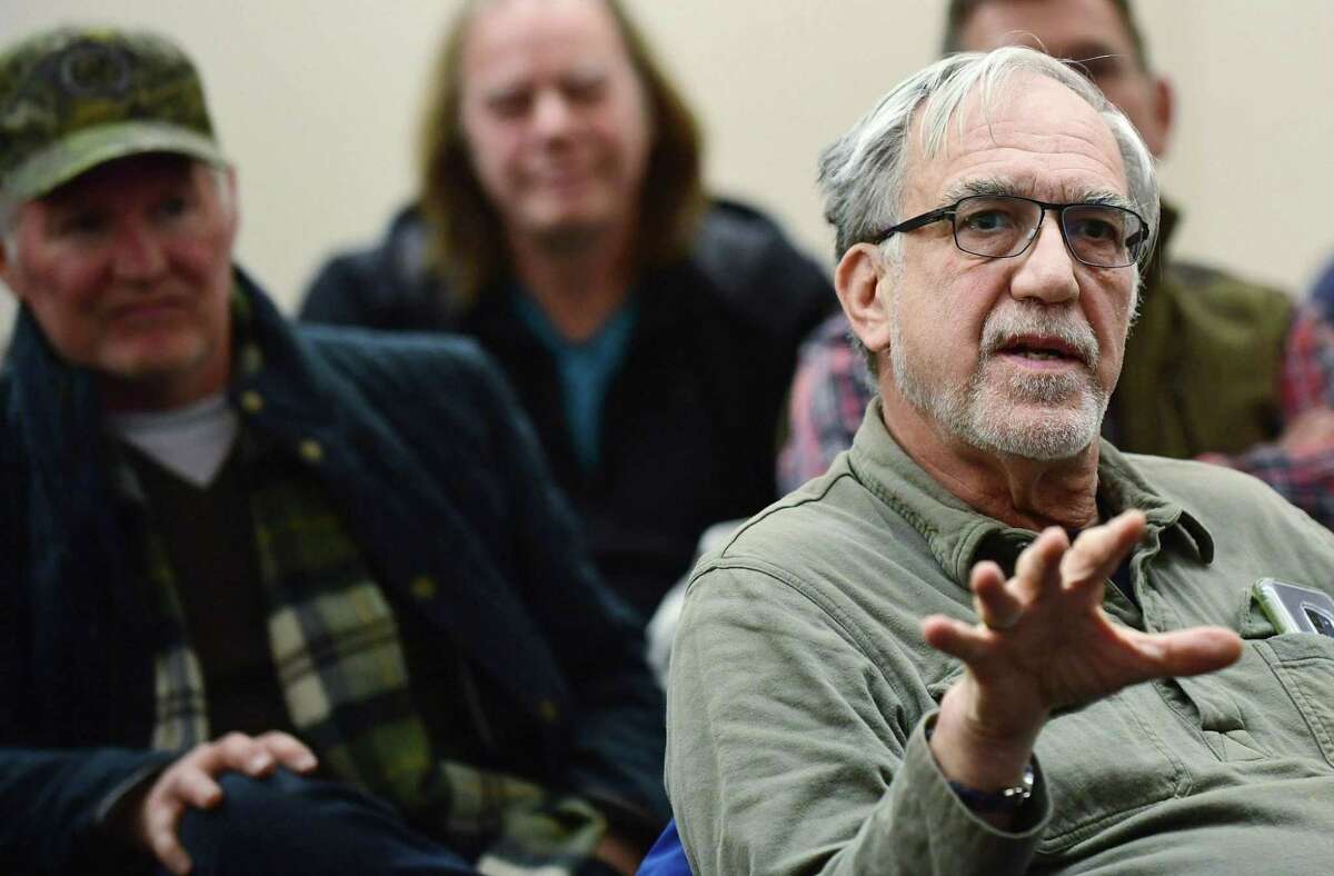 Norwalk resident Alan Kibbe speaks during an informational session presented by The Norwalk Parking Authority Wednesday, February 20, 2019, at the Yankee Doodle Garage conference room about its plans to add angled parking at Wall St and several nearby roads in Norwalk, Conn.