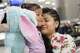 Guatemalan mother Sara Caal presses her 5-year-old daughter's cheek against her as they reunite on Thursday at George Bush Intercontinental Airport in Houston on Feb. 21, 2019. Caal and her daughter Alida were separated at the Texas-Mexico border last summer.